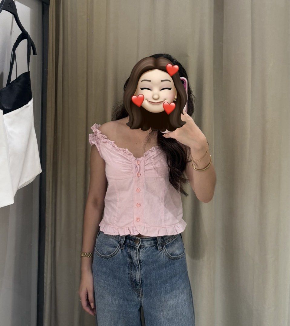 Pink Ruffle Top (Category: Blouses) located in Cavite. Submitted by loveyjw19 (Listing ID 1469119611, Image 2). Description: - Size Small - Color: Light pink, available in Black too - Style: Short-sleeve crop top with ruffle trim neckline - Condition: Worn once, practically brand new with no stains or loose threads.