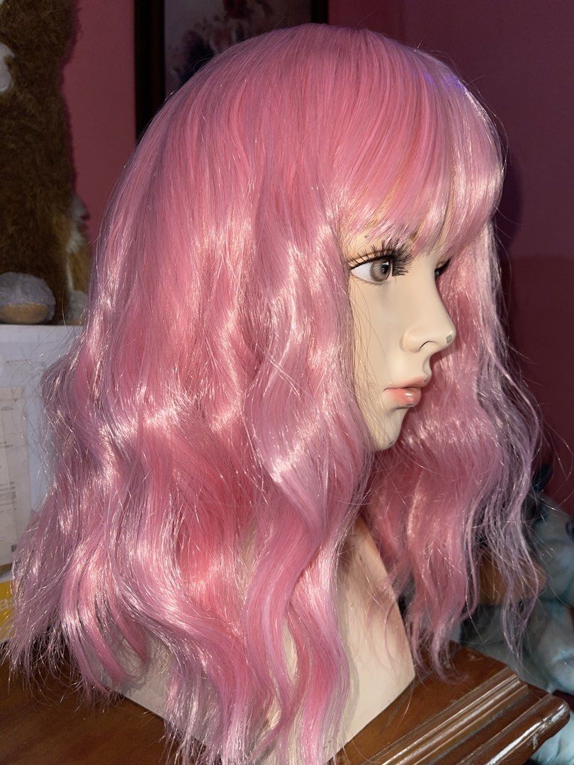 Pink Wavy Wig with Mannequin Head (Category: Hair Accessories) located in Catbalogan. Submitted by macprelovedstuffs (Listing ID 1469022569, Image 2). Description: Pink Wavy Wig with Mannequin Head Selling them as set, wig is brand-new and mannequin is sign of used with minor paint chips, Perfect for wig and hats display or for halloween proof Selling price: 680php w/ add. Sf Reason for selling: declutterring, so many mannequin head na sa shop Th