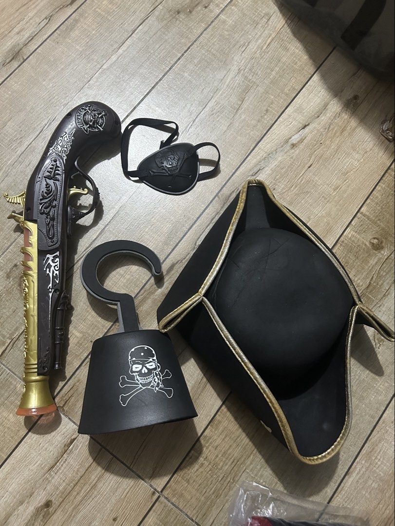 Pirate Costume Accessories Set Hat Gun Hook Eyepatch (Category: Caps & Hats) located in Paranaque City. Submitted by zac.sei (Listing ID 1469010022, Image 3). Description: - Complete pirate costume set, perfect for Halloween, parties, and themed birthdays - Includes tricorn hat with gold trim and skull emblem - Comes with a detailed toy flintlock pistol - Features a classic plastic hook hand and skull eye patch - Made of lightweight fabric and pl