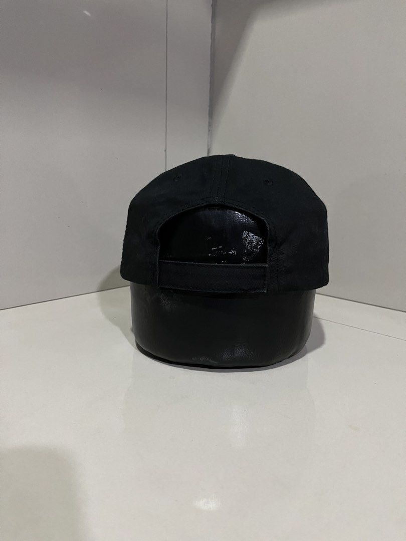 Pirelli Black Baseball Cap (Category: Caps & Hats) located in Maasin. Submitted by niconii090 (Listing ID 1468984705, Image 3). Description: - Brand: Pirelli - Color: Classic black with yellow and red embroidered logo patch - Design: Structured front panels with a curved brim - Fit: Adjustable strap closure at the back, one size fits most - Condition: Clean fabric, ready to wear .