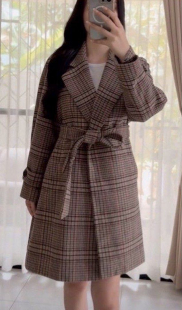 Plaid Brown Wool Autumn Coat (Category: Coats, Jackets and Outerwear) located in Manila. Submitted by eltums (Listing ID 1468994737, Image 2). Description: - Brand: Visit In New York - Design: Brown and black plaid wool coat - Features: Classic lapel collar, long sleeves, two front pockets - Details: Includes a matching tie belt to cinch the waist - Lining: Fully lined with smooth brown satin fabric Fits M-L.