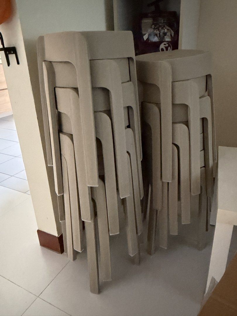 Plastic Stackable Stools beige (Category: Chairs) located in Singapore. Submitted by divya_karthik (Listing ID 1468970756, Image 2). Description: - Color beige - Sturdy and durable plastic build - Modern design with a center drainage/lifting hole - Stackable to save space when not in use - 14 pieces available ( can be given partially).
