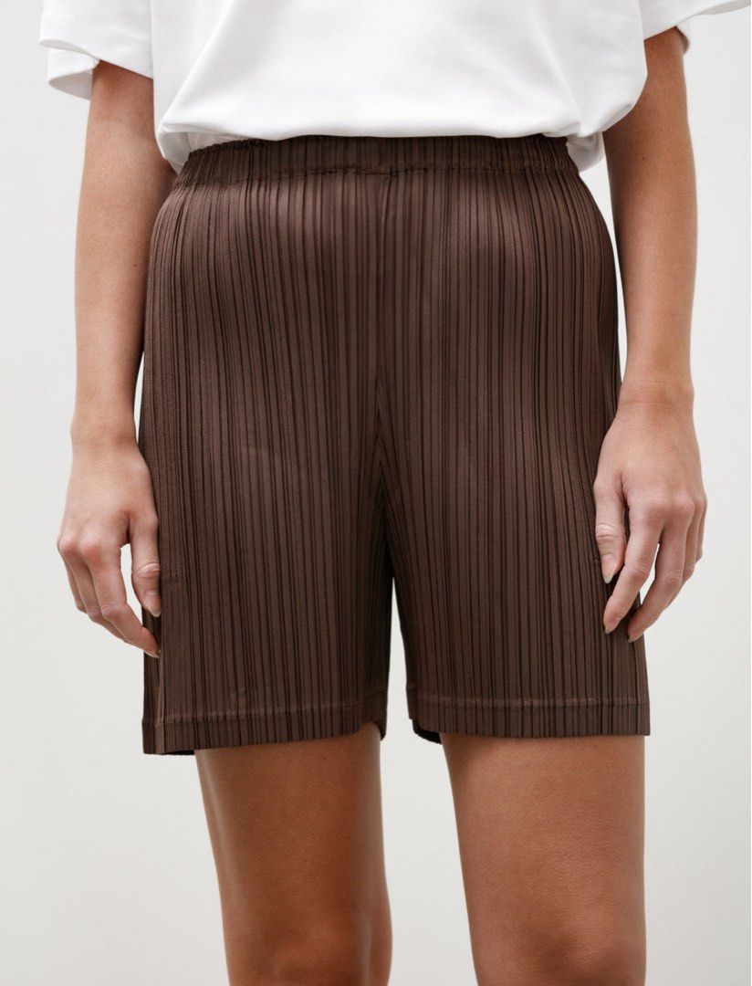 Pleats Please By Issey Miyake Loop Shorts (Category: Shorts) located in Polomolok. Submitted by larnel27 (Listing ID 1469059417, Image 2). Description: - In pristine condition | Authentic - Color rate 9.8 (Dark brown) - Waist 26-28 / Length 17 / Hem 17 Stretch - Flawless✨.