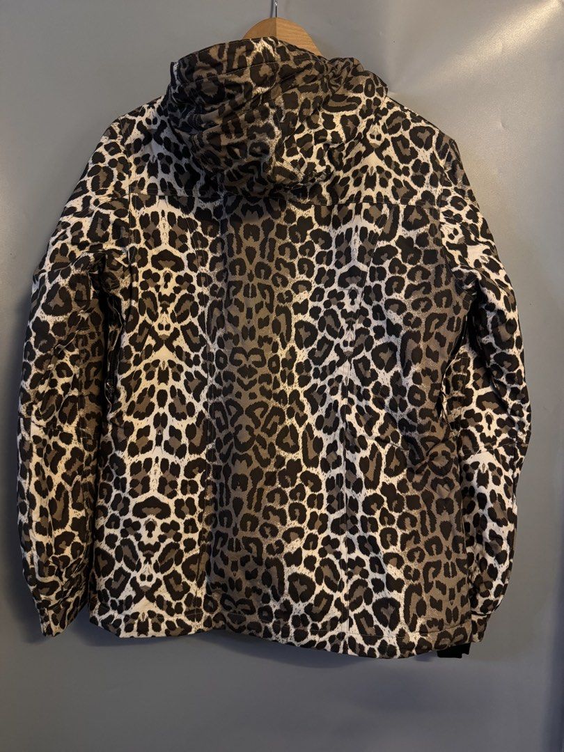 Plus Minus Created by Chiemsee Leopard Print Snow Jacket (Category: Coats, Jackets and Outerwear) located in Alaminos. Submitted by outfitcheck.ph (Listing ID 1469103667, Image 2). Description: - Brand/Model: Chiemsee Plus Minus ski jacket - Design: Bold black, grey, and white leopard print with graphic inner lining - Closure: Zip front with snap storm flap and attached hood - Technical Features: Multiple inside and out pockets, interior powder s