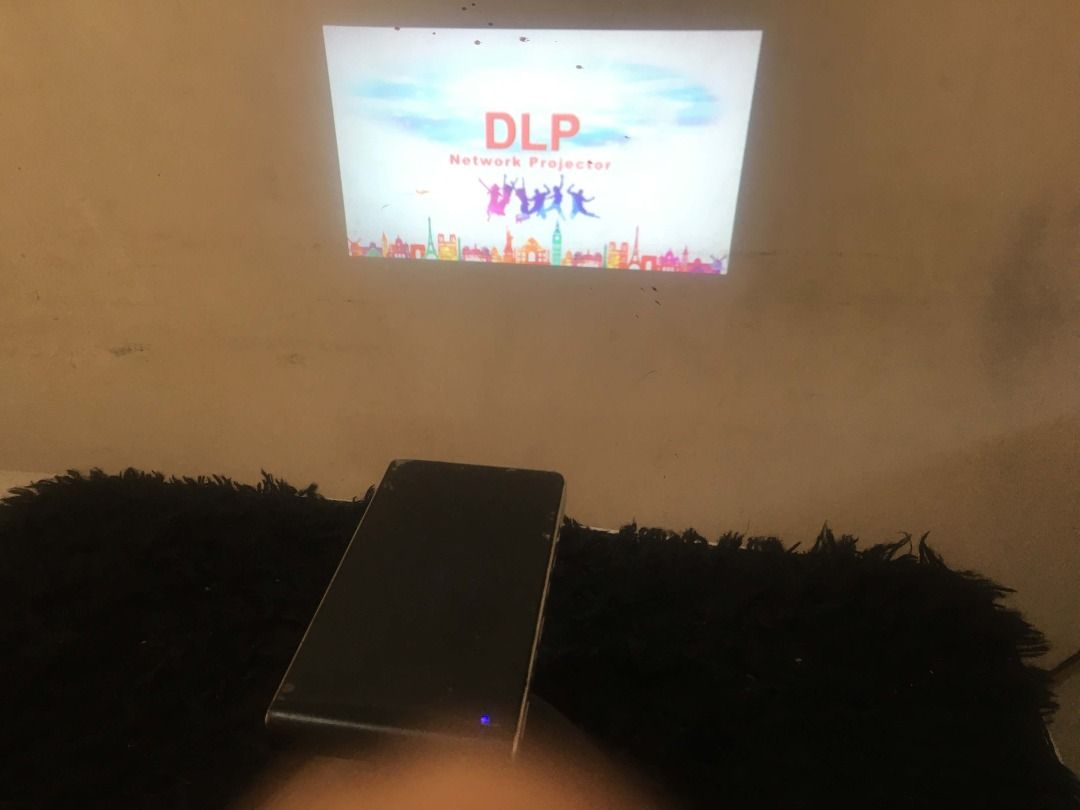 Pocket Project android from US (Category: Projectors) located in Bacoor. Submitted by rosemarie2021 (Listing ID 1469055771, Image 2). Description: selling my Smart pocket Projector traveler can watch movie anytime youtube etc. use for outdoor activity use for presentation use for mobile companion use for school and office use for movies or tv HDMI support Usb support files android charger unit pouch handle and charger.