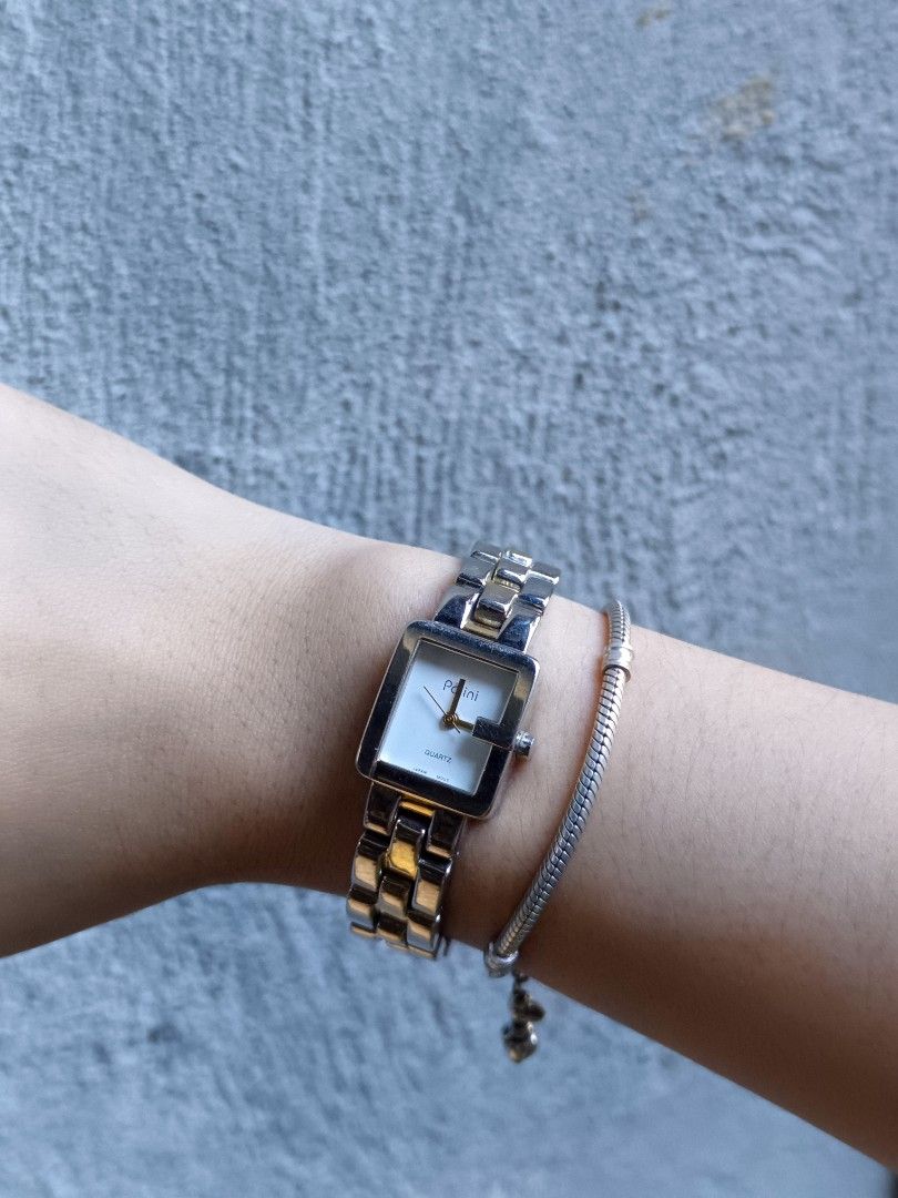 Polini two tone watch (Category: Women's Watches) located in Caloocan City. Submitted by klenggs (Listing ID 1468992976, Image 3). Description: Selling my two tone polini watch Japan movement,Sign of usage lng pero sofer nice pa. .