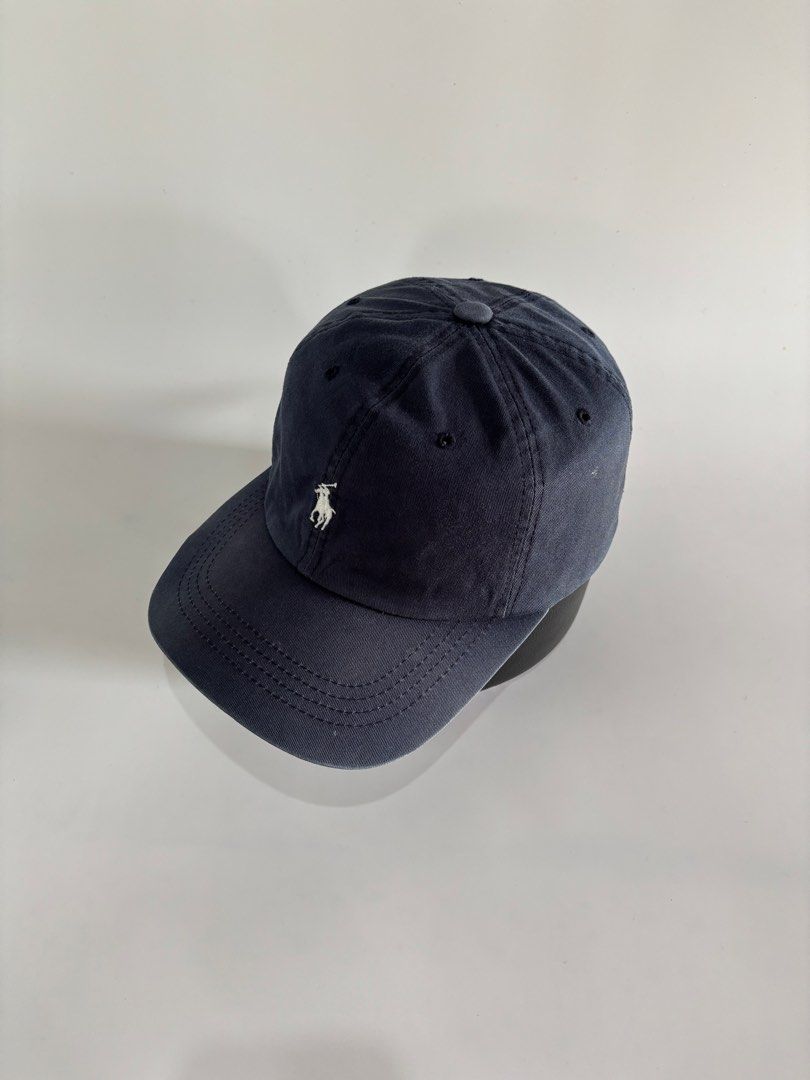Polo Ralph Lauren Ballcap (Category: Caps & Hats) located in Malaybalay. Submitted by haulsome (Listing ID 1468997080, Image 3). Description: Polo Ralph Lauren Ballcap -In excellent condition -In Navy Blue-white colorway -Features an embroidered little pony up front -Has minor yellow stain at back of the brim -Adult size, adjustable leather strap 700php, +sf.