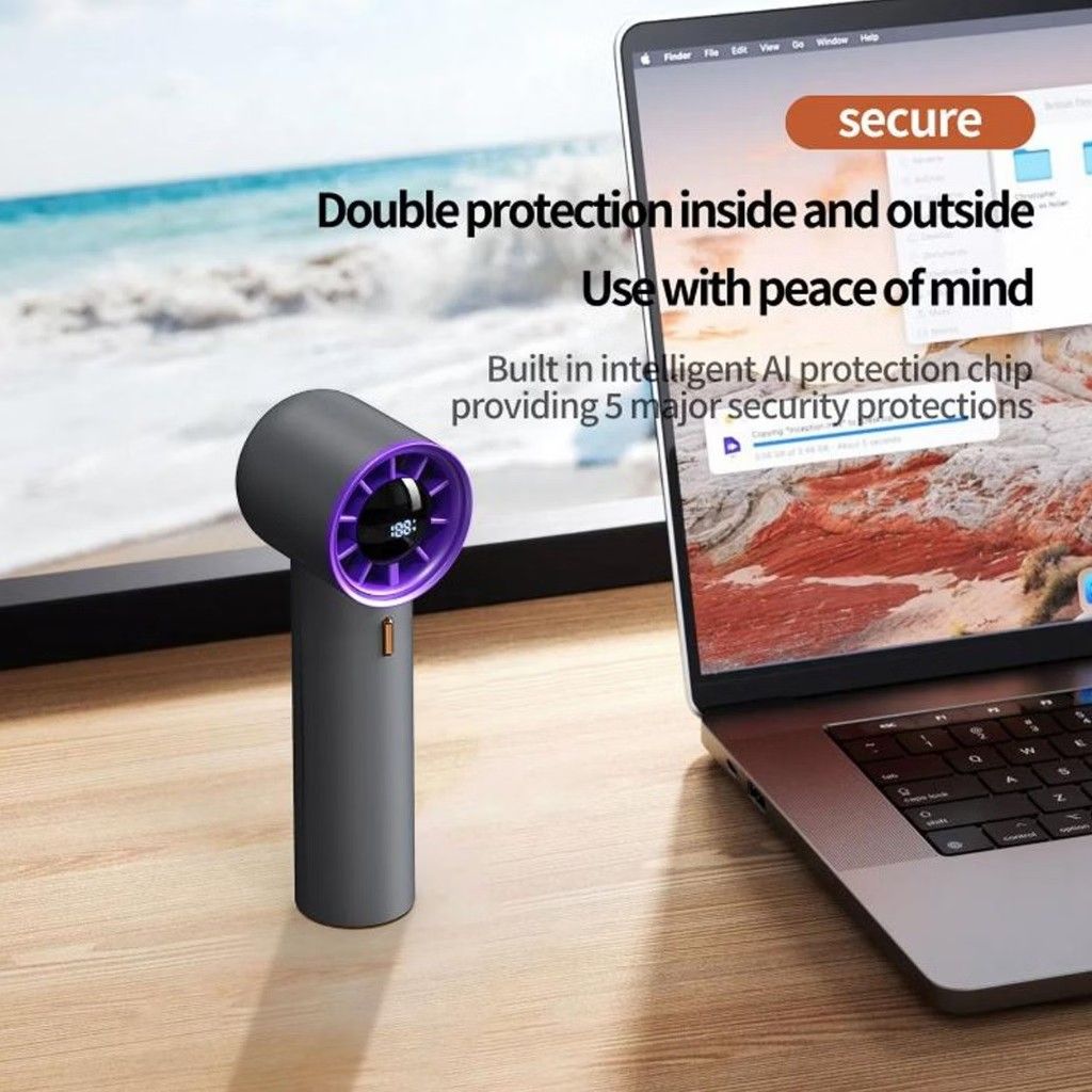 Portable Handheld Mini Fan with LCD Digital Display (Category: Fans) located in Dasmarinas. Submitted by sellvation (Listing ID 1469080975, Image 3). Description: - Sleek cylindrical design with a stylish purple-accented turbine head - Built-in LCD screen displays real-time battery level and wind speed settings - Powered by an intelligent AI protection chip for safe and reliable daily use - Compact and lightweight, perfect for carrying in your ba