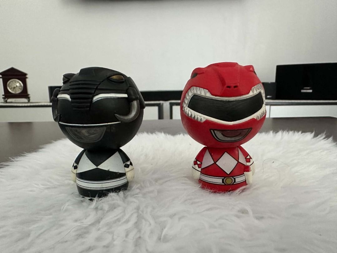 Power Rangers Black and Red Ranger chibi figures (Category: Figurines & Statues) located in Tarlac. Submitted by mandiryune (Listing ID 1468953413, Image 1). Description: - Item: Power Rangers Chibi Figurine Set - Characters: Red Ranger (Tyrannosaurus) and Black Ranger (Mastodon) - Design: Cute chunky heads in a standing pose - Material: Durable vinyl/plastic - Condition: Great collectible condition - Note: Selling as a set only.