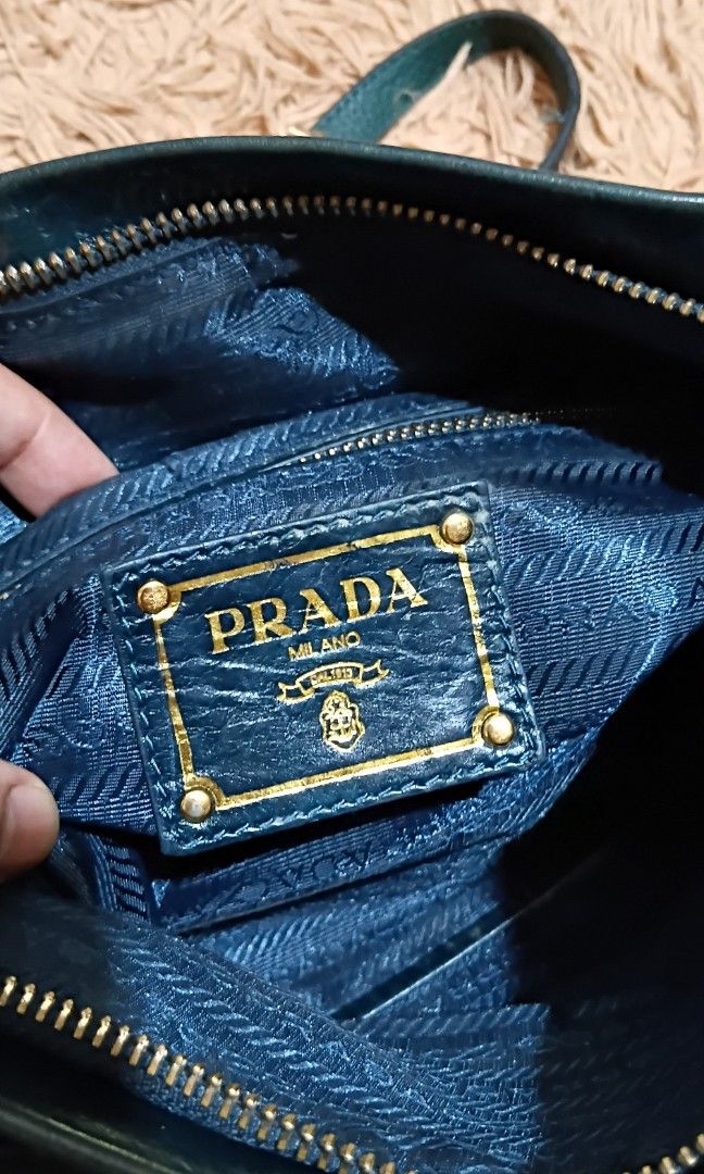 PRADA (Category: Cross-body Bags) located in Legazpi City. Submitted by nashaiza (Listing ID 1469024065, Image 3). Description: Prada Vintage made in italy coded gold hardware magnetic and zipper closure lampo under zipper replace strap Japan Source *authenticity not guarantee MOP: GCash Courier: J&T Express.