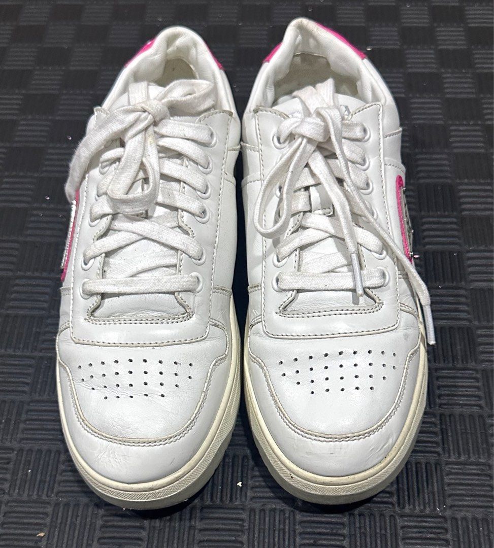 Prada Downtown Leather Sneakers (Category: Sneakers) located in Antipolo. Submitted by shopaho_nique (Listing ID 1469072083, Image 2). Description: AUTHENTIC Prada Downtown Leather Sneakers (White/Pink) Selling an authentic pair of women’s Prada Downtown low-tops in white with vibrant fuchsia pink accents and the iconic enameled triangle logo. • Model: Prada Downtown Low-Top (Style Code: 1E792M) • Size: EU 36 (Fits EU 36 - 36.5) • Material: 100% 