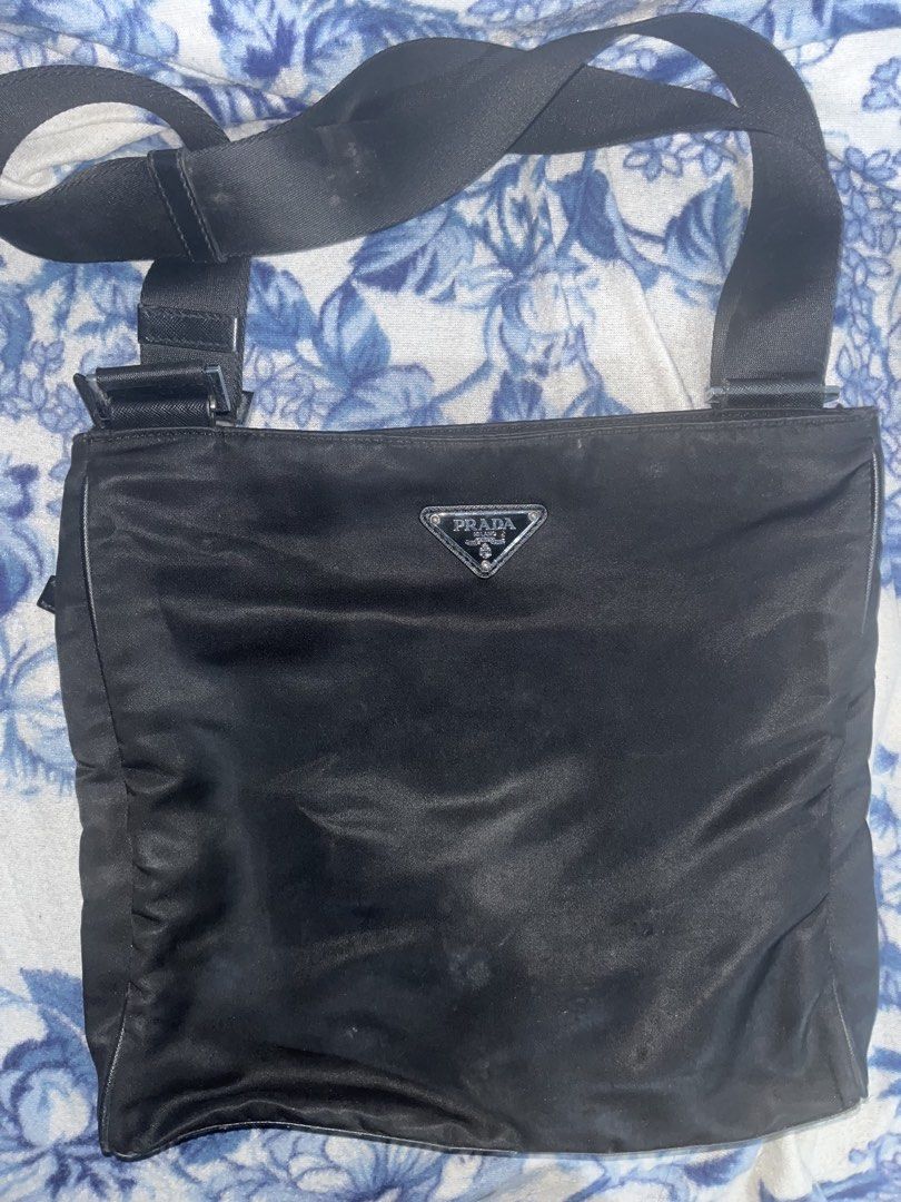 PRADA Messenger Bag (Category: Luxury Bags & Wallets) located in Manila. Submitted by garou_u (Listing ID 1469053858, Image 1). Description: -Lightly used only still good condition. -Negotiable price.