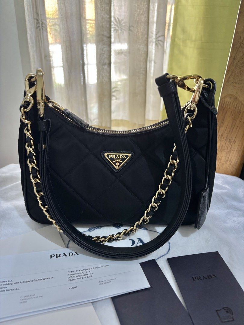 Prada Quilted Nylon Re edition (Category: Announcements) located in Quezon City. Submitted by ingridsfinds (Listing ID 1468959297, Image 3). Description: Almost new, super excellent condition Comes with Resibo, dustbag, cards rFID Rank condition 9.8/10.
