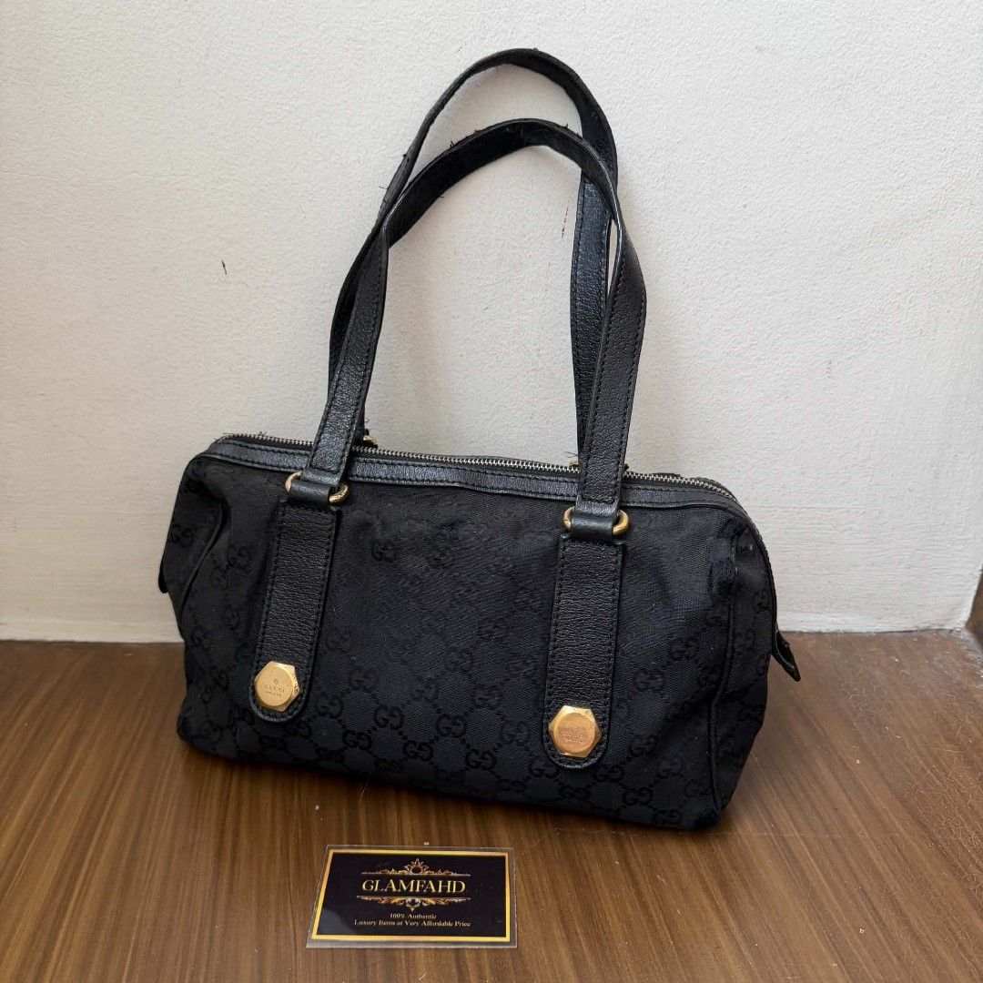 PRE OWNED AUTHENTIC GUCCI GG CANVAS BAG (Category: Luxury Bags & Wallets) located in Paranaque City. Submitted by Glamfahd (Listing ID 1469074419, Image 2). Description: Pre Owned Authentic GUCCI GG Bag Inclusion/s: None Condition Well Used condition Marks on exterior Marks on interior Abrasions on few area visible in close inspection Bag is really a great buy! Please manage your expectations as you are buying an authentic second hand item at a f