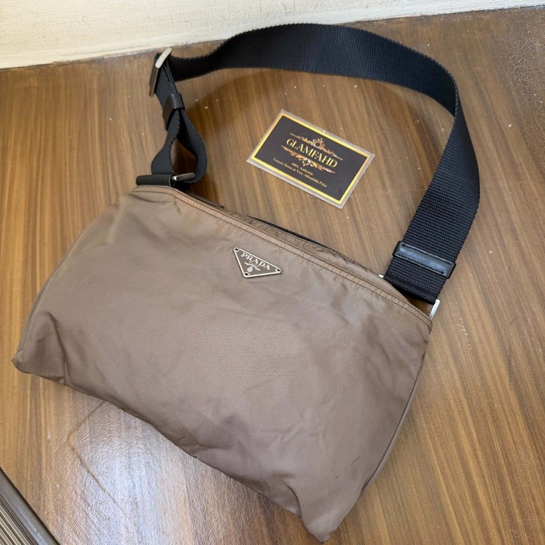 PRE OWNED AUTHENTIC PRADA NYLON BAG (Category: Luxury Bags & Wallets) located in Paranaque City. Submitted by Glamfahd (Listing ID 1469075798, Image 1). Description: Pre Owned Authentic PRADA Bag Inclusion/s: None Condition Well Used condition Marks on exterior Marks on interior Bag is really a great buy! Please manage your expectations as you are buying an authentic second hand item at a fraction of the cost.