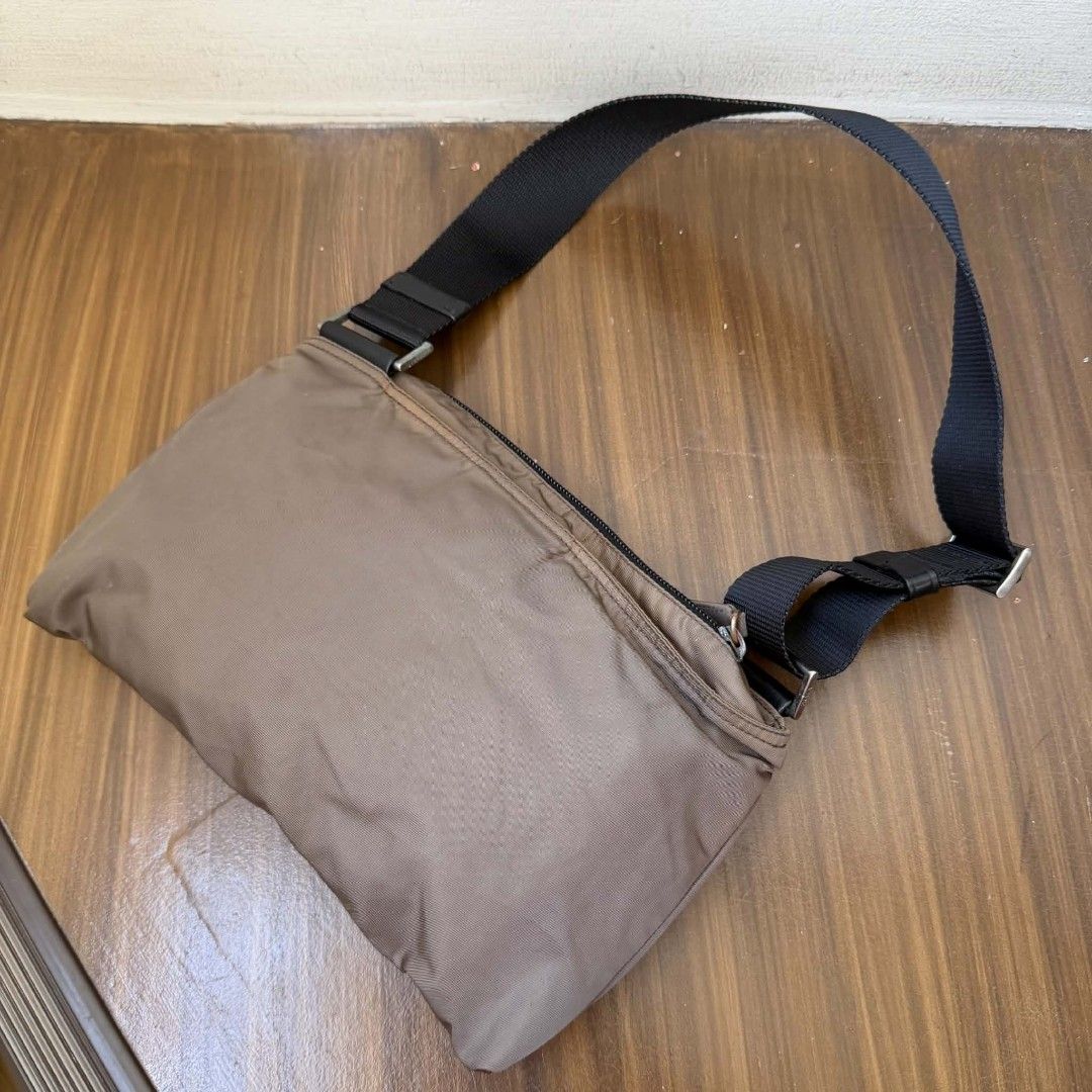 PRE OWNED AUTHENTIC PRADA NYLON BAG (Category: Luxury Bags & Wallets) located in Paranaque City. Submitted by Glamfahd (Listing ID 1469075798, Image 3). Description: Pre Owned Authentic PRADA Bag Inclusion/s: None Condition Well Used condition Marks on exterior Marks on interior Bag is really a great buy! Please manage your expectations as you are buying an authentic second hand item at a fraction of the cost.