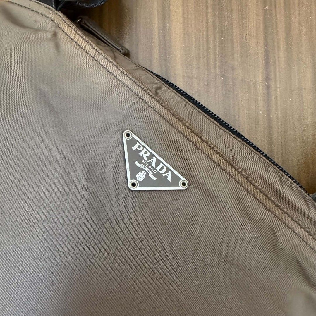 PRE OWNED AUTHENTIC PRADA NYLON BAG (Category: Luxury Bags & Wallets) located in Paranaque City. Submitted by Glamfahd (Listing ID 1469075798, Image 2). Description: Pre Owned Authentic PRADA Bag Inclusion/s: None Condition Well Used condition Marks on exterior Marks on interior Bag is really a great buy! Please manage your expectations as you are buying an authentic second hand item at a fraction of the cost.