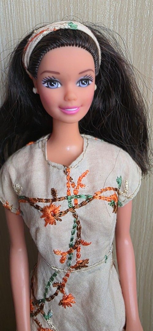 Preloved 90s Filipina Barbie (Category: Kids Toys) located in Luna. Submitted by macygreyz82 (Listing ID 1468940781, Image 2). Description: - Made in the Philippines by Richwell - Wearing handsewn dress by seller - With open toe mint green shoes (bakya) No issue MOP: GCash MOD: J&T only Item Location: La Union.