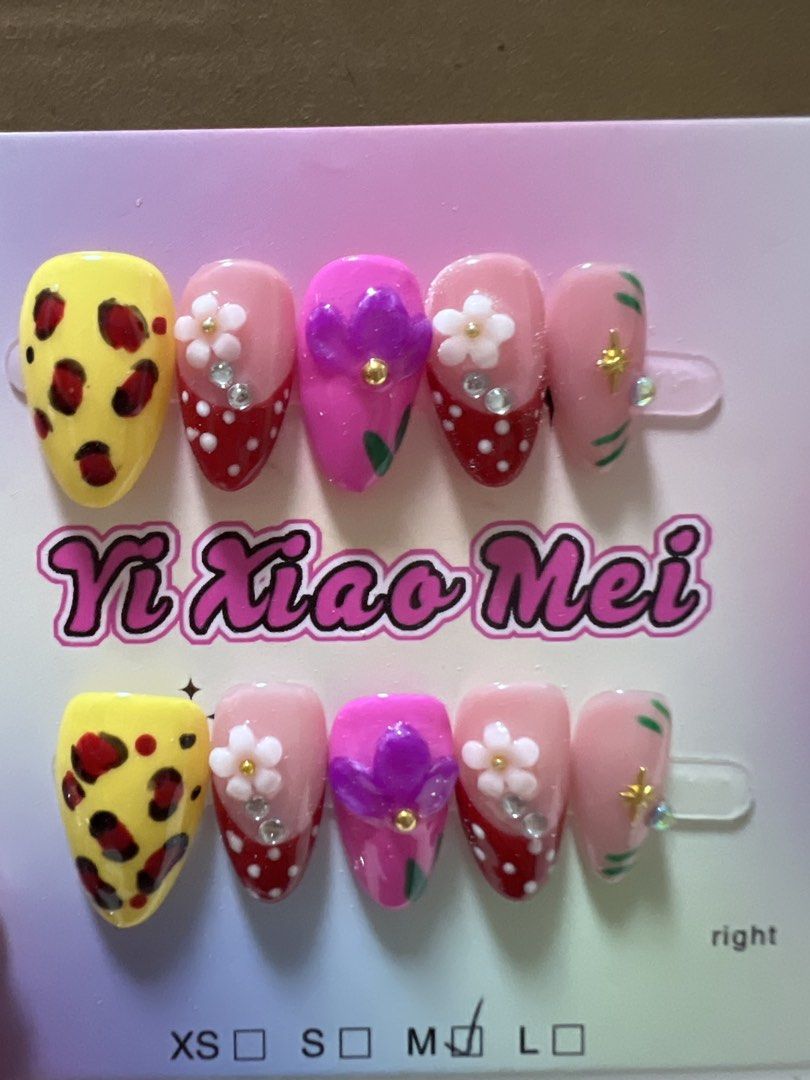 Press On Nail Sets Size Medium, 3d flowers, rhinestones (Category: Hands & Nails) located in Makati City. Submitted by kllevado (Listing ID 1469084731, Image 3). Description: Php 150 per set Never been used. Size: Medium Shape & Length: Short Almond Comes with free nail application kit Can meet up in Glorietta 12-1pm weekdays or pick up biñan / san pedro laguna area. Delivery fee c/o buyer. See other available designs. .