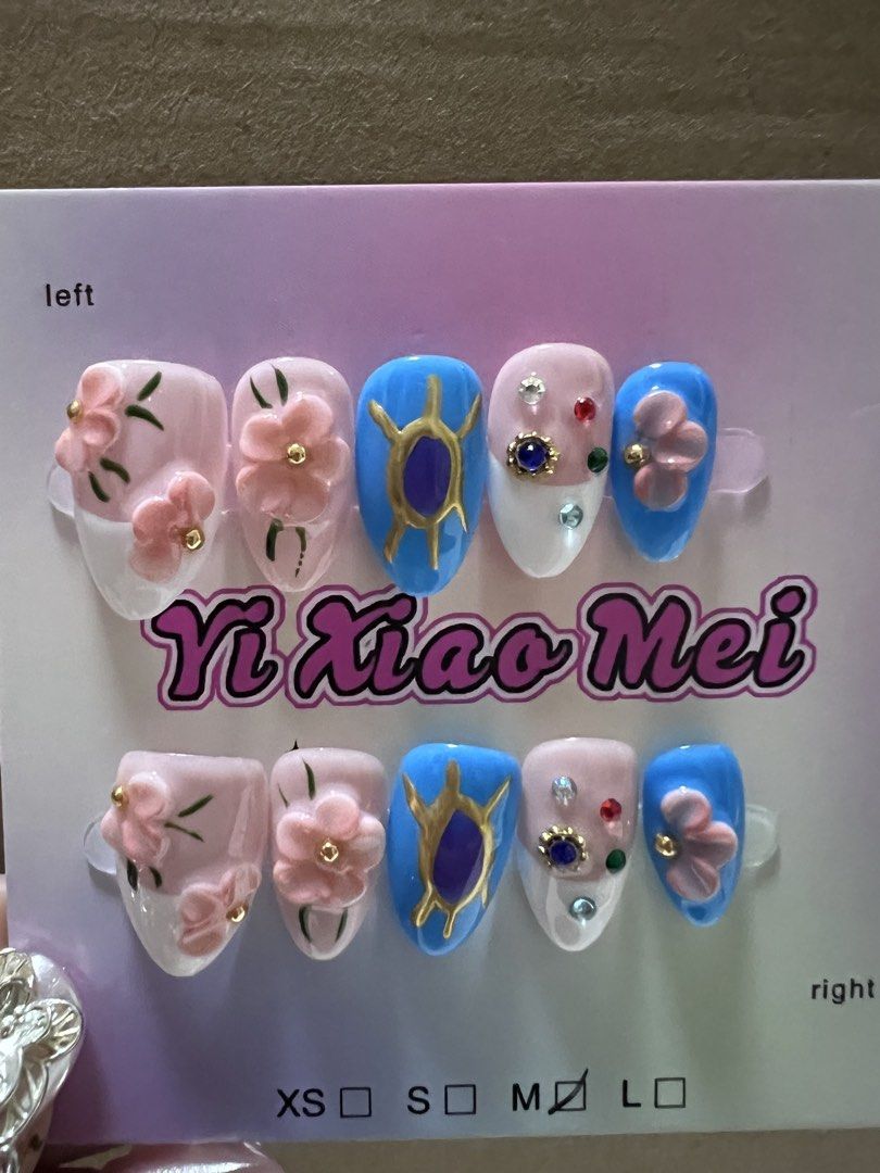 Press On Nails - Medium Size, 3d flowers, rhinestones (Category: Hands & Nails) located in Manila. Submitted by kllevado (Listing ID 1469083455, Image 2). Description: Php 150 each set Never been used. Size: Medium Shape & Length: Short Almond Comes with free nail application kit Can meet up in Glorietta 12-1pm weekdays or pick up biñan / san pedro laguna area. Delivery fee c/o buyer. See other available designs. .