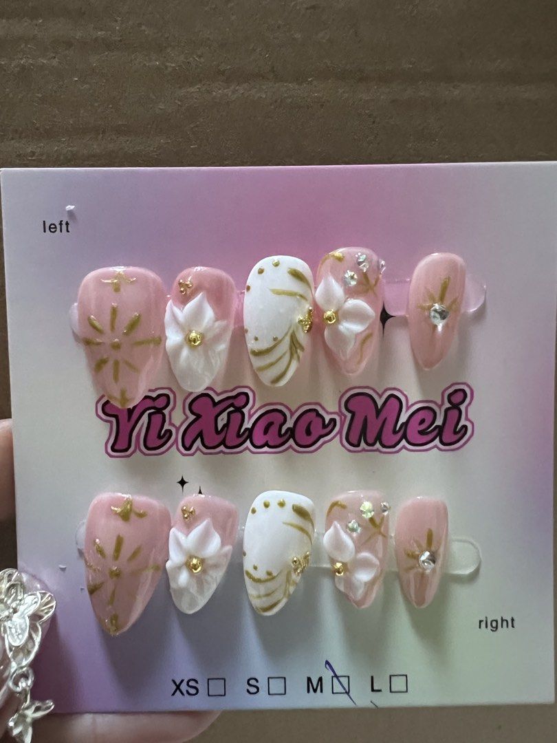 Press On Nails - Medium Size, 3d flowers, rhinestones (Category: Hands & Nails) located in Manila. Submitted by kllevado (Listing ID 1469083455, Image 1). Description: Php 150 each set Never been used. Size: Medium Shape & Length: Short Almond Comes with free nail application kit Can meet up in Glorietta 12-1pm weekdays or pick up biñan / san pedro laguna area. Delivery fee c/o buyer. See other available designs. .