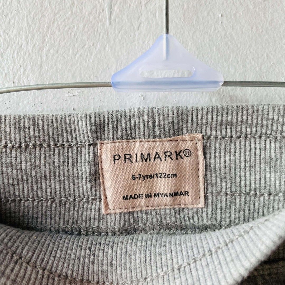 Primark Grey Joggers Sweatpants (Category: Babies & Kids Fashion) located in San Mateo. Submitted by safeearth21 (Listing ID 1468954863, Image 3). Description: - Brand: Primark - Size: 6-7 years (122cm) - Color: Grey - Waist: Elasticated with adjustable drawstring - Design: Two side pockets and ribbed ankle cuffs - Material: Soft and comfortable for everyday wear - Condition: Good overall condition.