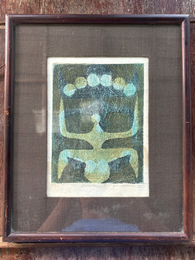 Print By Master Emet Valiente (Category: Art & Prints) located in Malolos. Submitted by jjantiques (Listing ID 1468953045, Image 1). Description: - Original abstract art print in earthy tones of green, blue, and black - Hand-signed and numbered 29/50 with authentic pencil inscriptions at the top - Elegantly framed in a dark wood frame with textured matting and a glass cover - Ready to hang and perfect for upgrading your home or office space.
