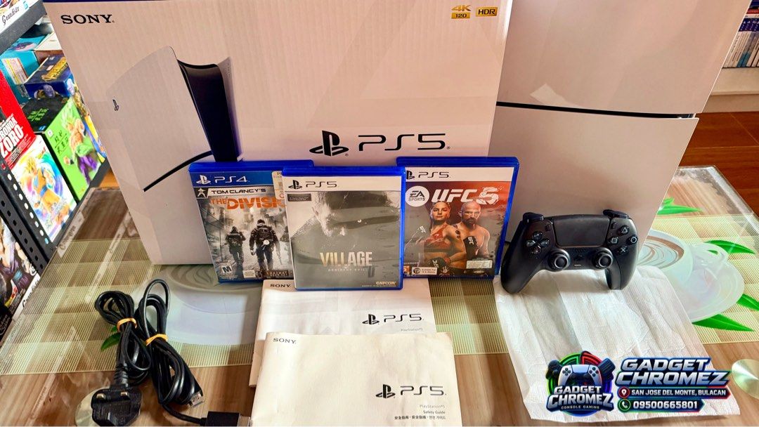 PS5 SLIM Disc Edition 1TB (Category: PlayStation) located in San Jose del Monte. Submitted by gadget_chromez (Listing ID 1469069305, Image 2). Description: 🎮 PS5 SLIM Disc Edition 1TB ✅ Condition: 9/10 ✅ Mint Condition, barely used. ✅ Updated Latest Firmware ✅ All Original, well maintained and fully working ✅ Complete With Box and Manuals ✅ Cable Accessories ✅ Original DS5 Controller (Midnight Black) ✅ Comes with 3 FREE PHYSICAL GAMES • Resident