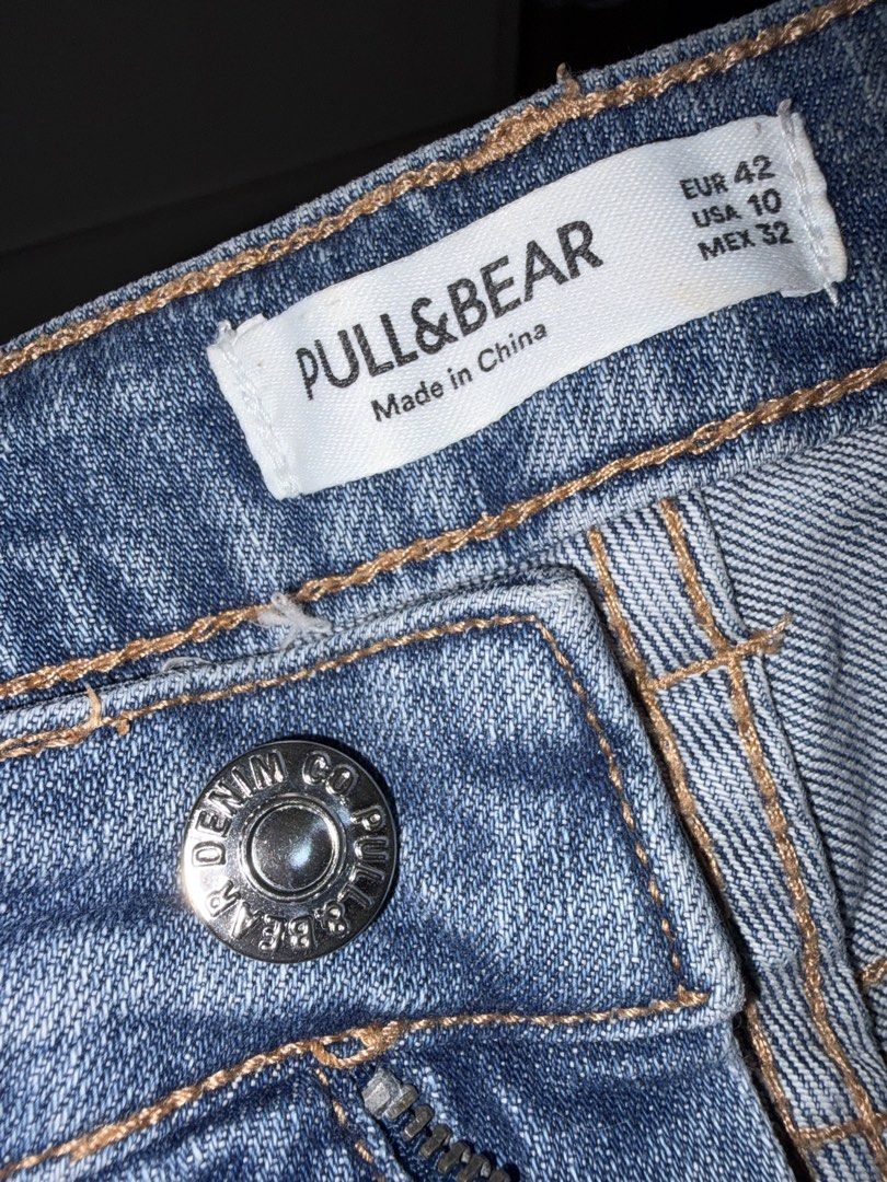 Pull&Bear Distressed Denim Shorts Size EUR 42 (Category: Shorts) located in Siquijor. Submitted by yhostuff (Listing ID 1469016145, Image 3). Description: Pull&Bear denim shorts in a medium blue wash. Mid-rise fit with distressed details near the front pockets. Classic five-pocket styling with back pockets and a leather patch at the waistband. Metal button closure and zip fly. Size EUR 42, USA 10, MEX 32. Women: L-XL RFS: Downsizing P.S. Visit my