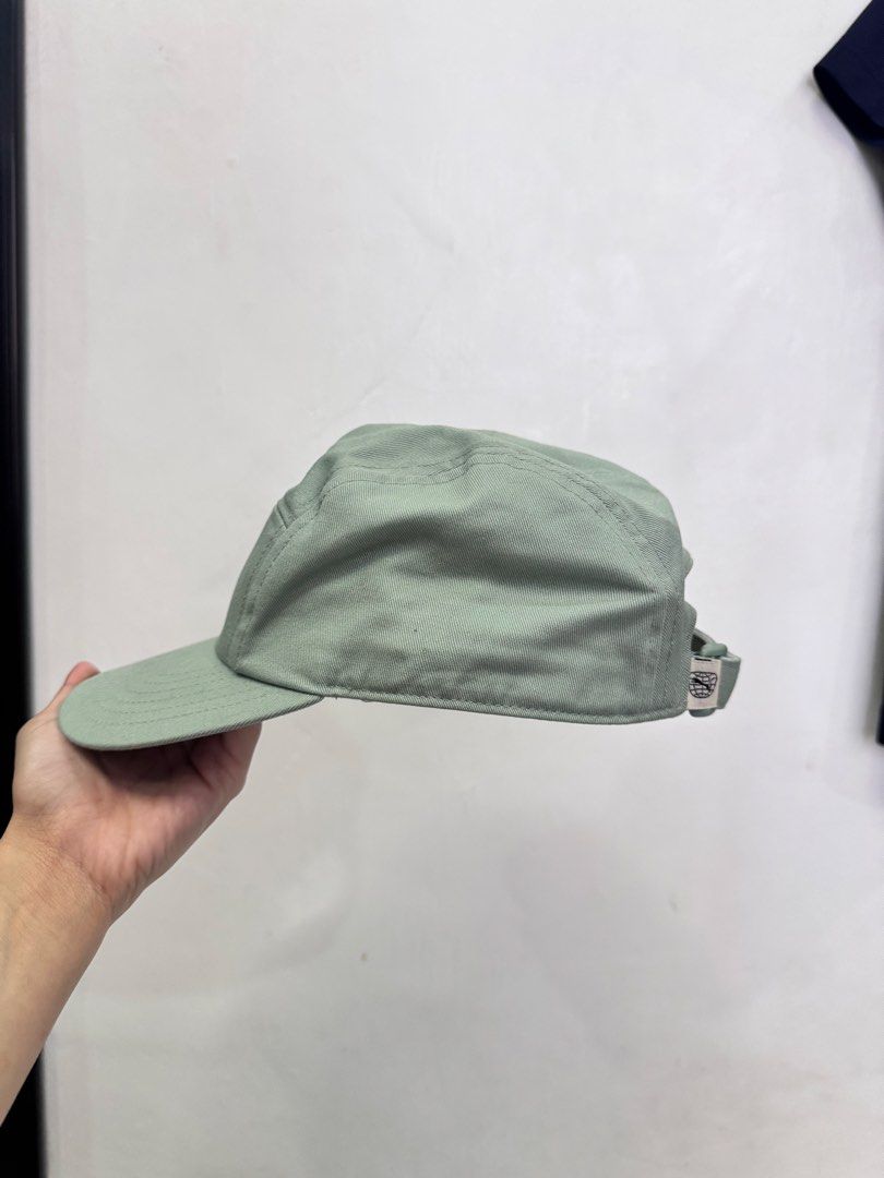 Puma Green Cap Hat (Category: Caps & Hats) located in Tarlac. Submitted by kyasonik (Listing ID 1468962385, Image 2). Description: - Color: Classic Green - Design: Front logo embroidery with Puma text graphic inside a circle - Fit: Adjustable strap at the back for a customized fit - Details: Interior tags with care instructions and Puma branding intact - Condition: Clean fabric throughout, great addition to casual outfits.
