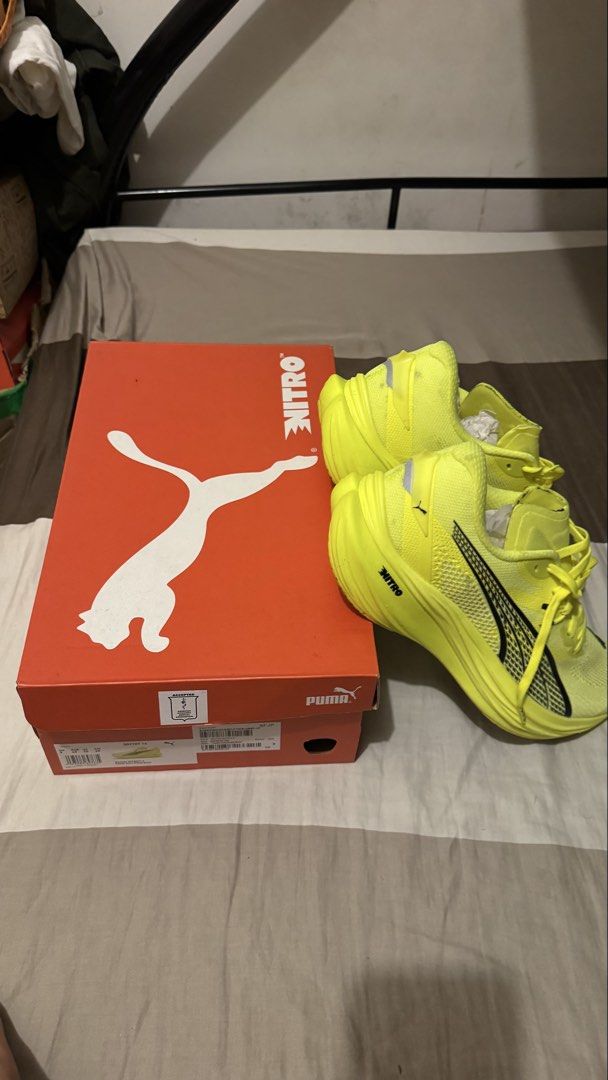 Puma Nitro Running Shoes Neon Yellow (Category: Sneakers) located in Manila. Submitted by kimlj (Listing ID 1468989916, Image 1). Description: - Brand: Puma Nitro running shoes - Color: Bright neon yellow with black Puma formstrip - Cushioning: Advanced Nitro foam midsole for superior comfort - Condition: Used Once, with box - Perfect for running, workouts, or casual wear.