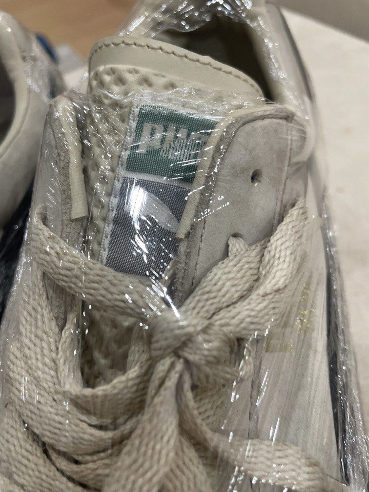Puma White and Black Sneakers (Category: Sneakers & Footwear) located in Manila. Submitted by bedlambuzz (Listing ID 1469053128, Image 2). Description: Wysiwg No box Plastic wrapped for storage Worn as described Clean soles as I keep my shoes clean.
