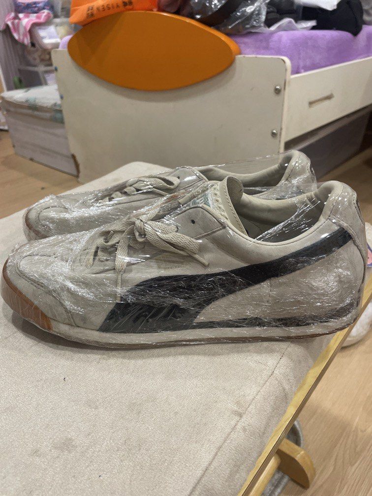 Puma White and Black Sneakers (Category: Sneakers & Footwear) located in Manila. Submitted by bedlambuzz (Listing ID 1469053128, Image 3). Description: Wysiwg No box Plastic wrapped for storage Worn as described Clean soles as I keep my shoes clean.