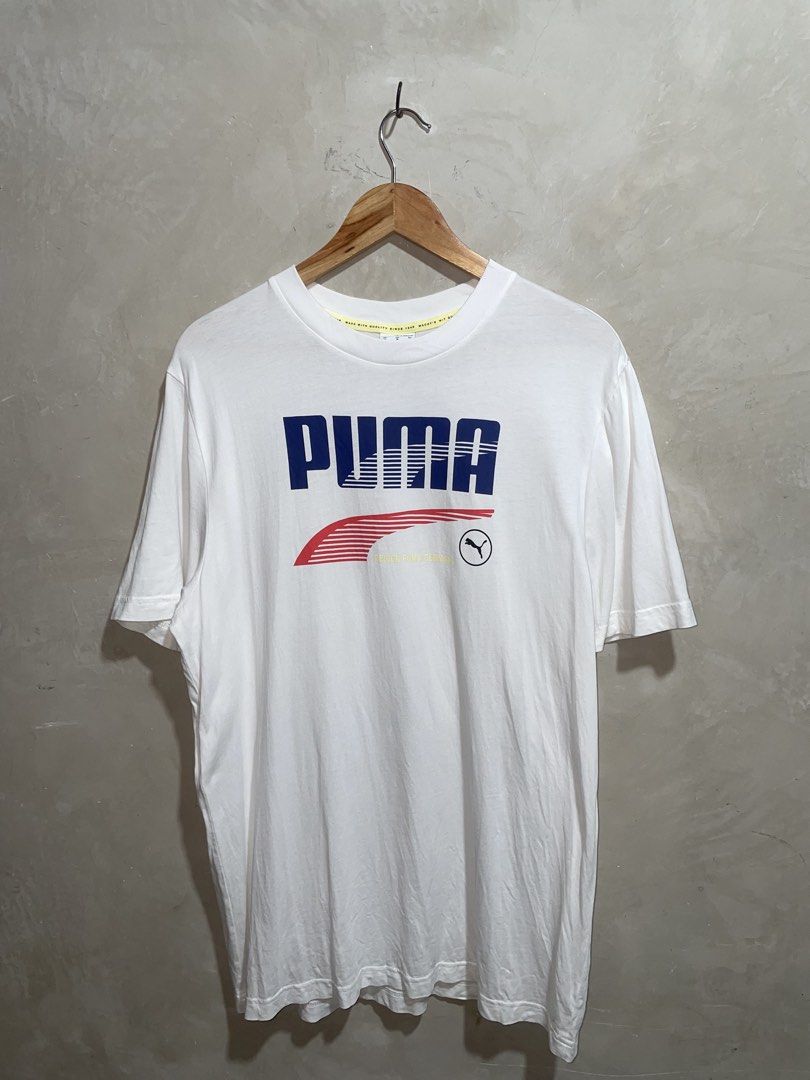 Puma White Graphic T-Shirt (Category: Shirts) located in Molave. Submitted by thriftedstore.horse (Listing ID 1469099983, Image 1). Description: Condition- excellent Issue- none Color rate- 9.8/10 .