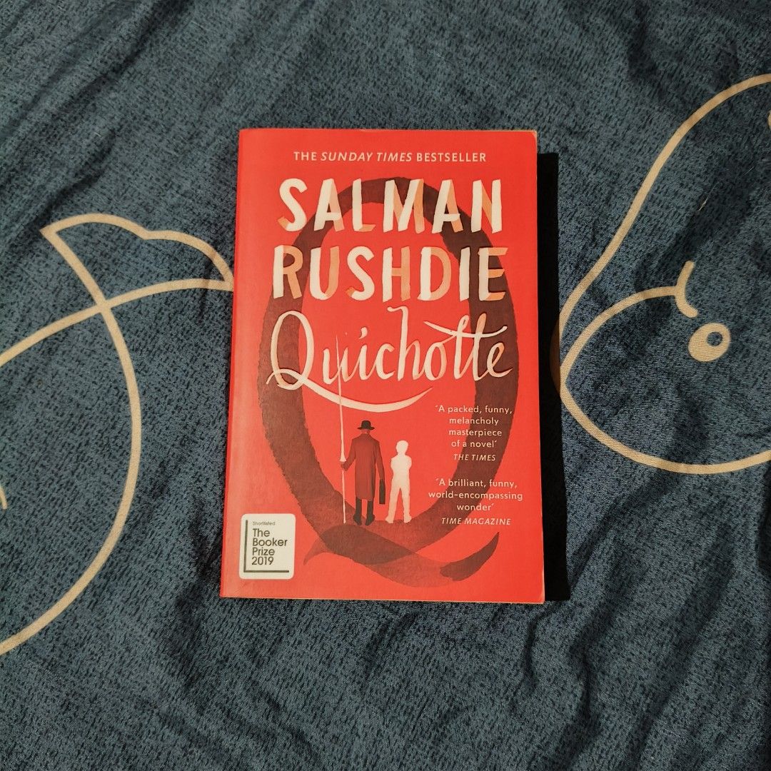 Quichotte by Salman Rushdie (Category: Storybooks) located in Santo Domingo. Submitted by rajjinni (Listing ID 1469060420, Image 1). Description: - Title: Quichotte by Salman Rushdie - Edition: Vintage paperback with a striking bright red cover - Recognition: Features the Booker Prize 2019 shortlist badge - Condition: Clean, intact spine with slight page edge yellowing due to age - Perfect addition for fans of celebrated contemporary literature.