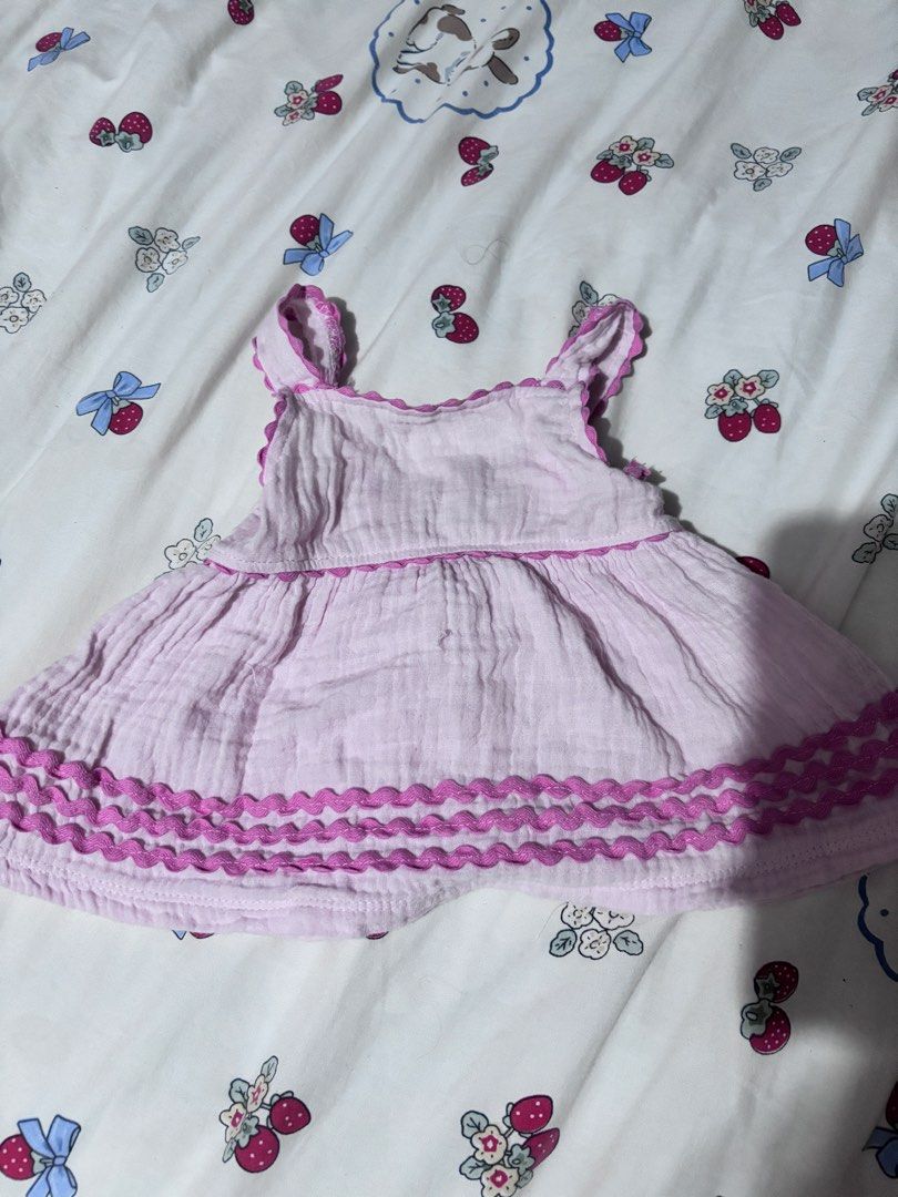 Rabbit Bear Organic Pink (Category: Babies & Kids Fashion) located in Imus. Submitted by xinyi133 (Listing ID 1468997388, Image 1). Description: - Brand/Style: Rabbit Bear organic cotton baby dress - Size: 12M - Color: Soft pink with bright pink trim - Design: Ruffled shoulder straps, gathered bodice, and scallop embroidery hem - Comfort: Lightweight, highly breathable fabric ideal for warm weather - Convenience: Easy slip-on design.