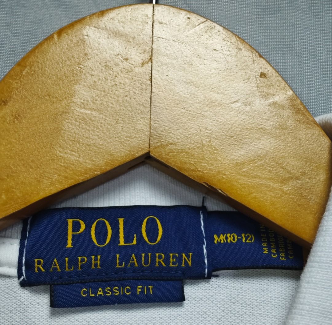 RALPH LAUREN KIDS WHITE POLO (Category: Babies & Kids Fashion) located in Imus. Submitted by eykc01 (Listing ID 1469043421, Image 2). Description: EUC-LIKE NEW 10-12 ON TAG FITS 8-10YO (16X24/25) **WITH WASHABLE LIGHT STAINS .