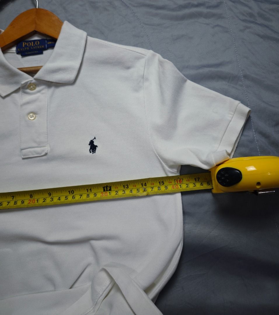 RALPH LAUREN KIDS WHITE POLO (Category: Babies & Kids Fashion) located in Imus. Submitted by eykc01 (Listing ID 1469043421, Image 3). Description: EUC-LIKE NEW 10-12 ON TAG FITS 8-10YO (16X24/25) **WITH WASHABLE LIGHT STAINS .
