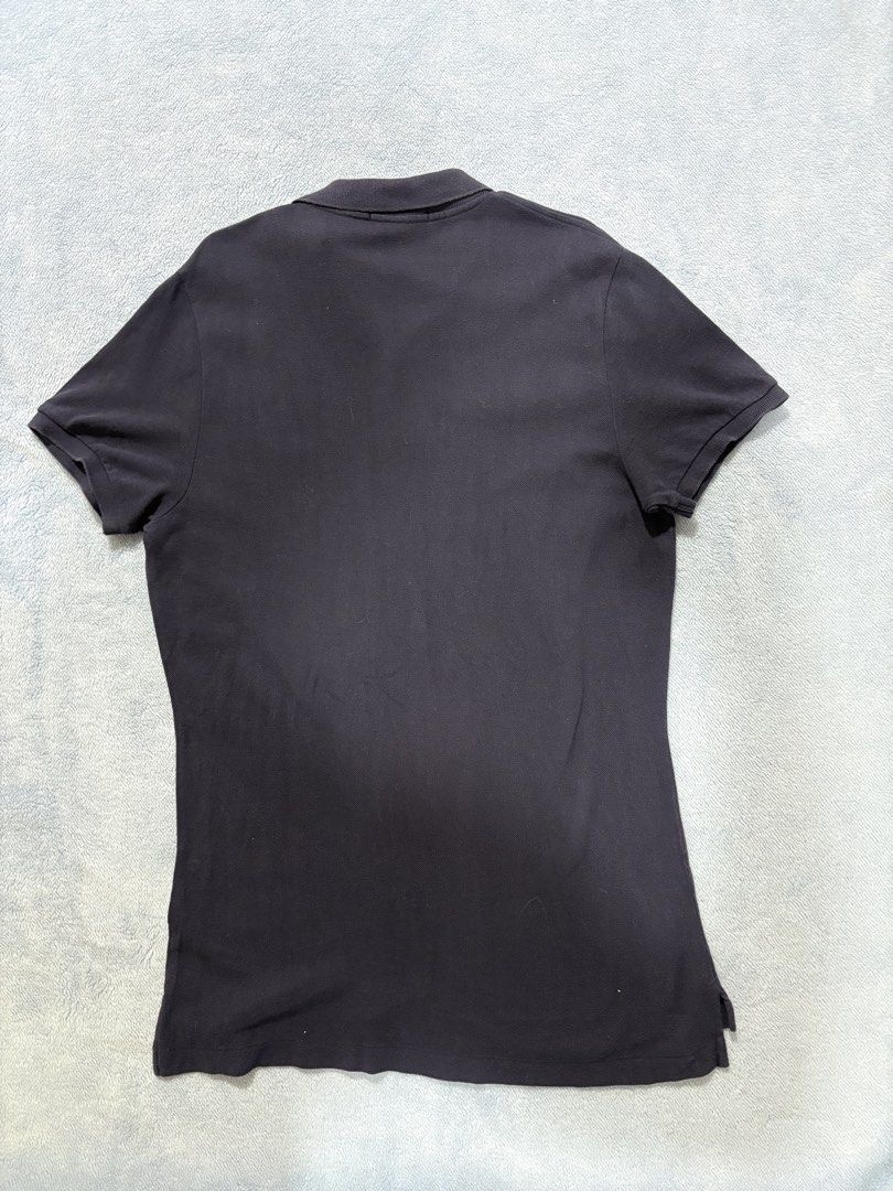 RALPH LAUREN Navy Polo Shirt (Category: Tshirts & Polo Shirts ) located in Alburquerque. Submitted by ukay_ni_edgar (Listing ID 1469017971, Image 2). Description: Understated luxury with a classic navy colorway and signature red pony embroidery. A timeless staple for any wardrobe..