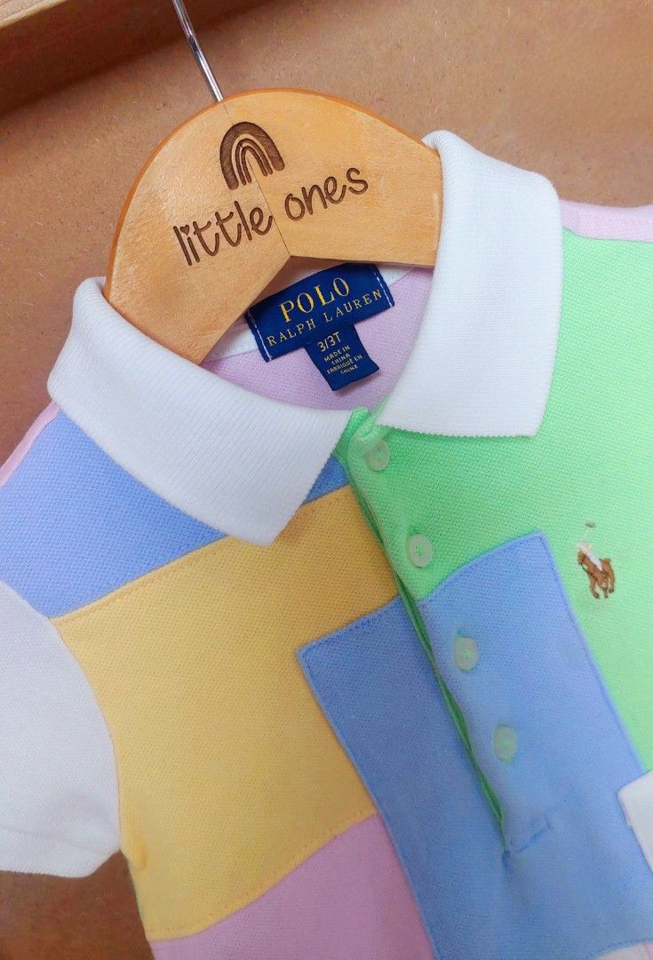 Ralph Lauren Polo Patchwork Dress Size 3T (Category: Babies & Kids Fashion) located in Caloocan City. Submitted by clairyyyyy (Listing ID 1468936393, Image 2). Description: - Brand: Ralph Lauren - Style: Multi-color patchwork polo dress with short sleeves and polo collar - Details: Front button placket, iconic embroidered pony on the chest, and a white ruffled hem with eyelet embroidery - Size: 3/3T (Toddler) - Perfect for: Cute, chic everyday we