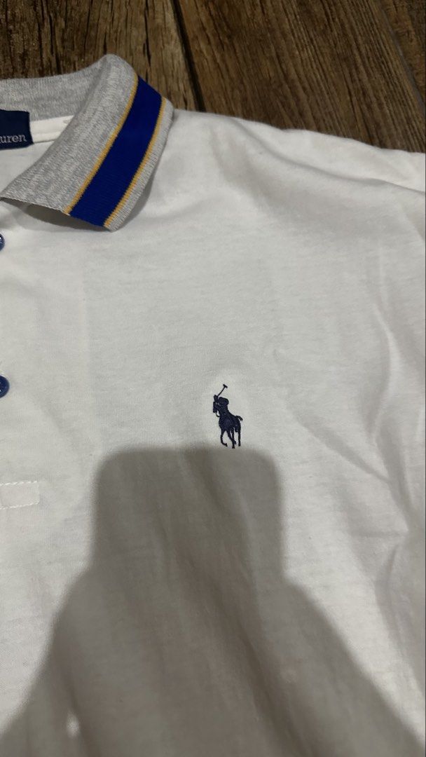 RALPH LAUREN WHITE POLO (Category: Tshirts & Polo Shirts ) located in Manila. Submitted by urban-vintage_2 (Listing ID 1468966124, Image 2). Description: ISSUE: SEE THE PICS FOR ISSUE (NEED WASH) MOP :GCASH (NO COD) SHIP VIA: LALAMOVE & J&T LOCATION: PASIG CITY LENGTH: 27 WIDTH :22.
