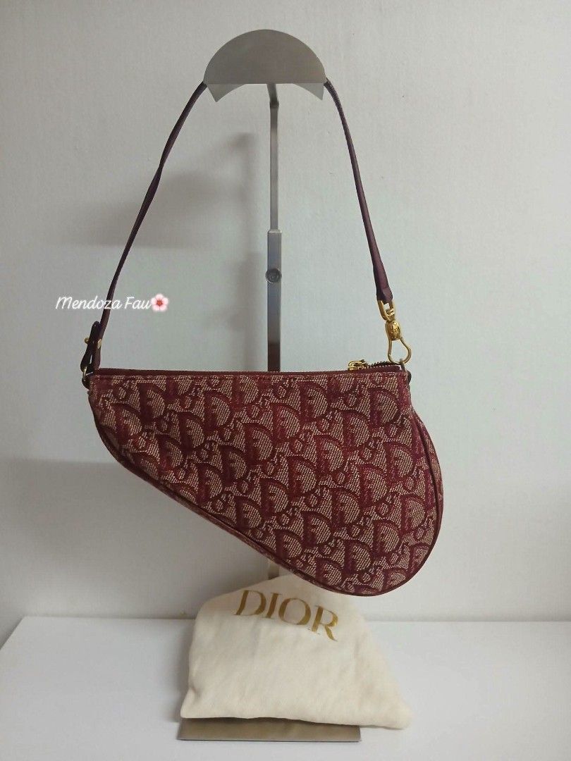 Rare Christian Dior mini saddle pochette (Category: Luxury Bags & Wallets) located in Iba. Submitted by kuripot_socialite (Listing ID 1469034897, Image 2). Description: Rank A. Malinis in & out. with dustbag ✅️Guaranteed orig. ✅️Money back if proven fake. DISCLAIMER: NO COPYRIGHT INFRINGEMENT INTENDED.ALL CREDIT GOES TO THE RIGHTFUL BRAND OWNERS. Mendoza Fau is not affiliated with any photo,brand & logos mention on this post.We are selling prelov