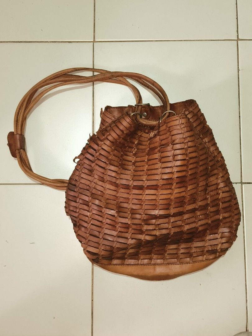 Recreation Brown Woven Leather Bucket Bag (Category: Shoulder Bags) located in Manila. Submitted by bigtym.picker (Listing ID 1469013344, Image 1). Description: FOR SALE!!! PLS SEE PIC FOR DETAILS. Selling all items AS IS PLS. manage your Expectation We accept shipping nationwide Meetup - BACOOR or near MOA - Brand: Recreation - Style: Brown woven leather bucket bag - Size: Medium - Features: Soft woven body, solid leather base, and strap - Inter