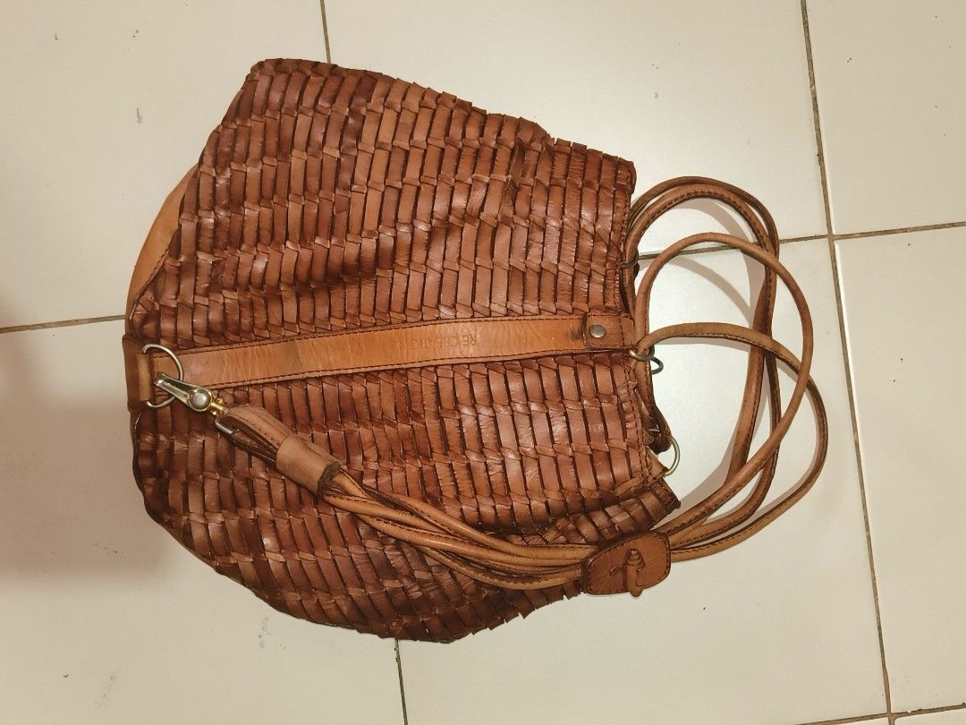 Recreation Brown Woven Leather Bucket Bag (Category: Shoulder Bags) located in Manila. Submitted by bigtym.picker (Listing ID 1469013344, Image 2). Description: FOR SALE!!! PLS SEE PIC FOR DETAILS. Selling all items AS IS PLS. manage your Expectation We accept shipping nationwide Meetup - BACOOR or near MOA - Brand: Recreation - Style: Brown woven leather bucket bag - Size: Medium - Features: Soft woven body, solid leather base, and strap - Inter