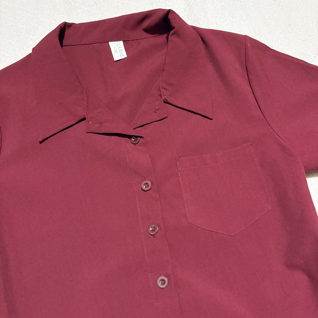 Red Blouse Polo (Category: Shirts) located in Bulacan. Submitted by luvjww (Listing ID 1469120843, Image 2). Description: - Color: Red Maroon - Size: L Shoulder: 39cm Bust: 92cm Sleeve Length: 16.5cm Length: 52cm - Details: Single chest pocket on the right side, smooth fabric, matching front buttons -Used.