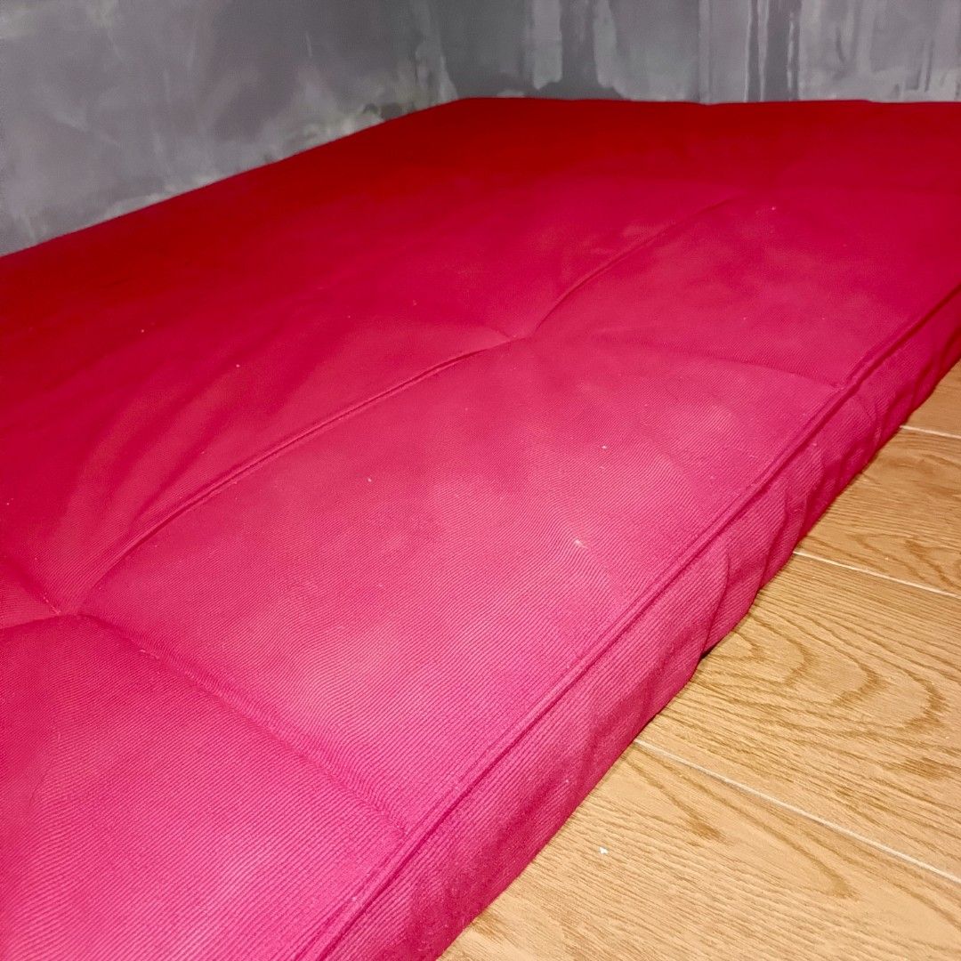 Red Foldable Floor Mattress Sofa Bed (Category: Bed Frames & Mattresses) located in Caloocan City. Submitted by peejaymagr68020 (Listing ID 1468979034, Image 2). Description: - Vibrant red color that adds a pop of style to any room - Versatile design: folds flat as a bed or doubles as a casual lounge seat - Tufted cushions keep padding even and comfortable - Ideal for small spaces, gaming, relaxing, or hosting overnight guests - Clean fabric, lig