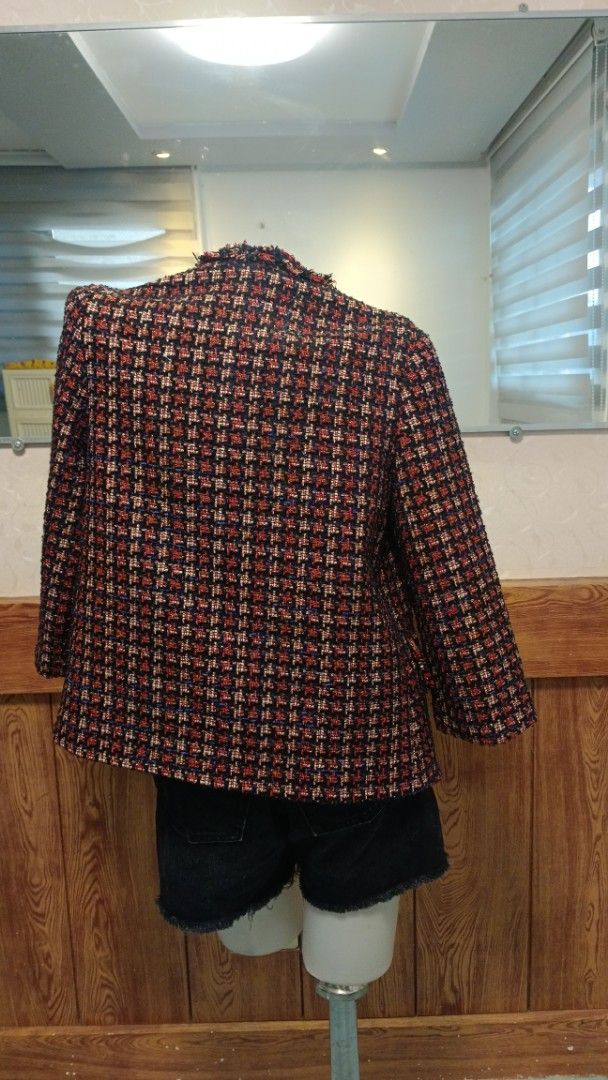 Red navy tweed jacket with houndstooth pattern (Category: Coats, Jackets and Outerwear) located in General Santos City (Dadiangas). Submitted by amzonshop (Listing ID 1468982684, Image 3). Description: - Red and navy tweed jacket with classic houndstooth pattern - Open front design with stylish black double-breasted button details - Textured fringe trim on lapels, cuffs, and hem - Structured shoulders - Heavy weave fabric accented with subtle met