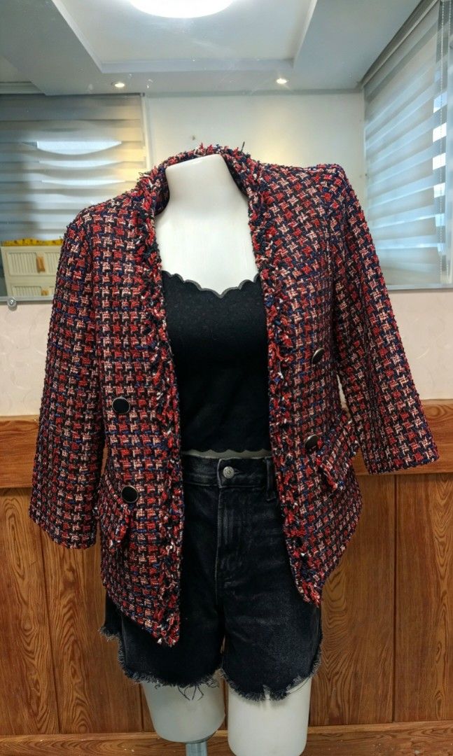 Red navy tweed jacket with houndstooth pattern (Category: Coats, Jackets and Outerwear) located in General Santos City (Dadiangas). Submitted by amzonshop (Listing ID 1468982684, Image 1). Description: - Red and navy tweed jacket with classic houndstooth pattern - Open front design with stylish black double-breasted button details - Textured fringe trim on lapels, cuffs, and hem - Structured shoulders - Heavy weave fabric accented with subtle met