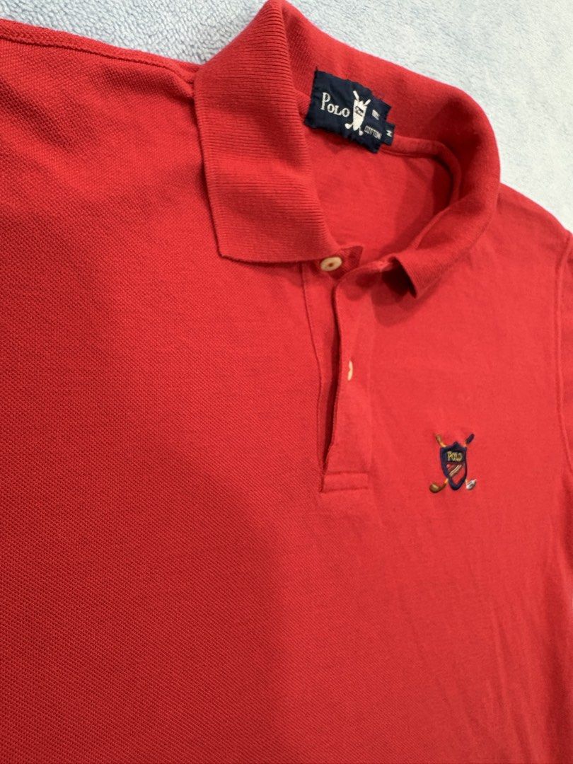 Red POLO (Category: Tshirts & Polo Shirts ) located in Alburquerque. Submitted by ukay_ni_edgar (Listing ID 1469019126, Image 2). Description: Bold red, standout crest, timeless drip. A classic that hits different!.