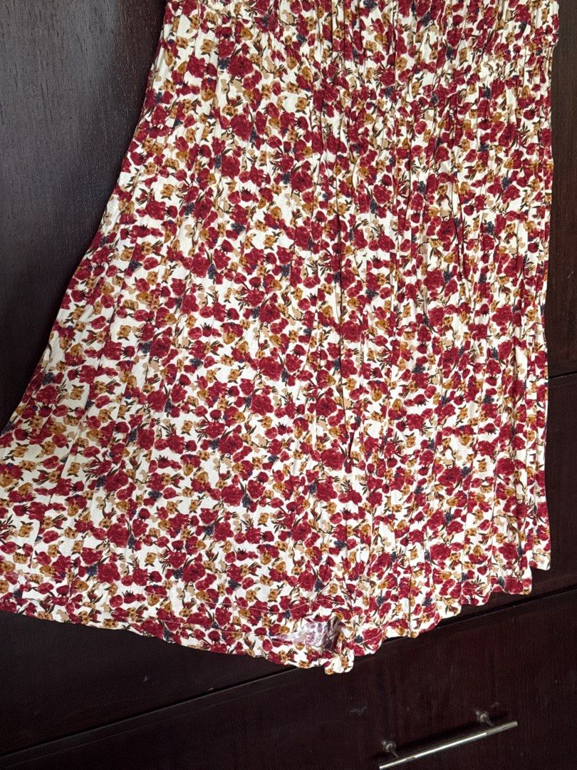 Redgirl Floral Print Romper Extra Large (Category: Rompers) located in Santo Tomas. Submitted by toughu (Listing ID 1468960086, Image 2). Description: - Brand: Redgirl - Size: Extra Large (XL) - Pattern: All-over red, white, and yellow floral print - Design: Sweetheart neckline with front tie detail, puff sleeves, and shorts bottom - Material: Lightweight, breezy, and comfortable for warm weather - Condition: Excellent, tag clearly attached insid